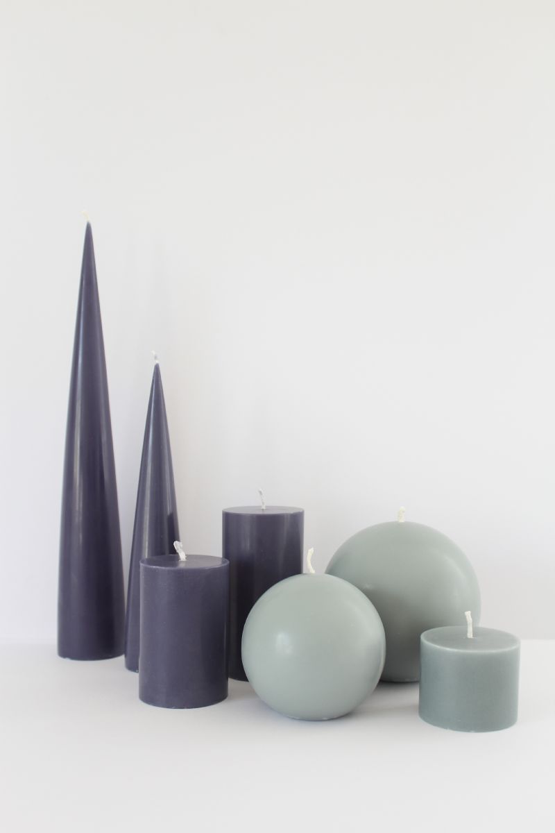 image og cone candles, ball candles and pillar candles in steel blue, sage green and stone colours