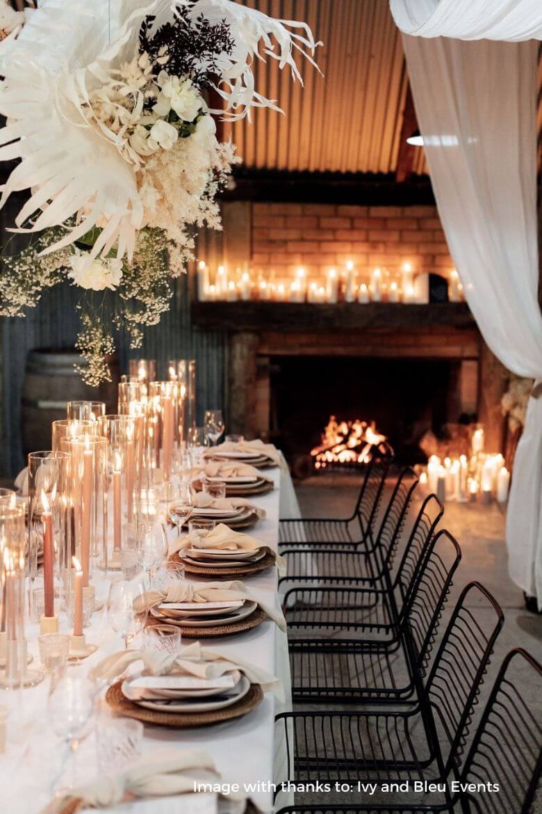 Barn wedding with tall candles