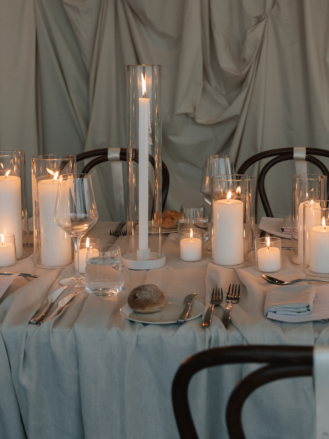 White 30cm Dinner Candles with Small White Amara Ceramic Holders and Sleeves - Set of 12